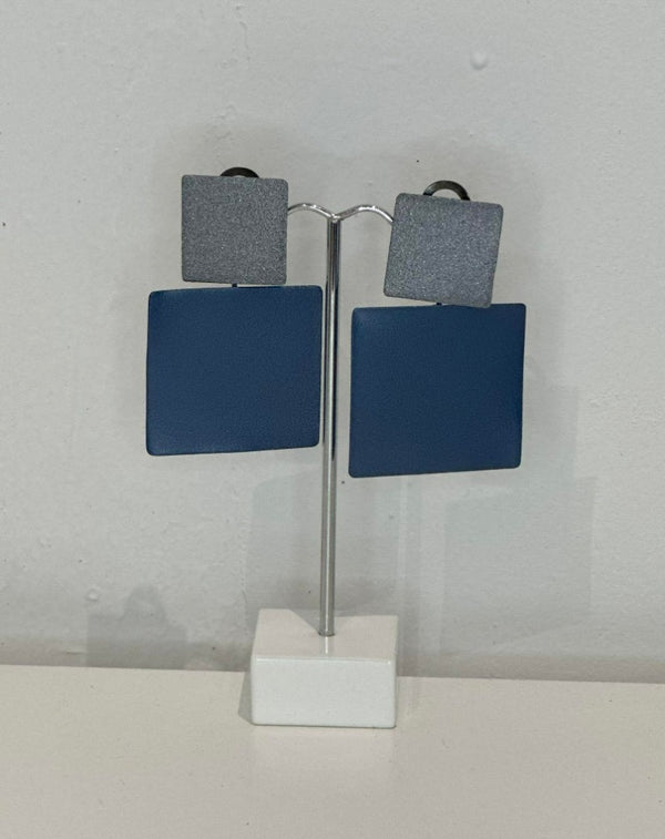 Greek Cargo blue and silver metallic clip on earrings