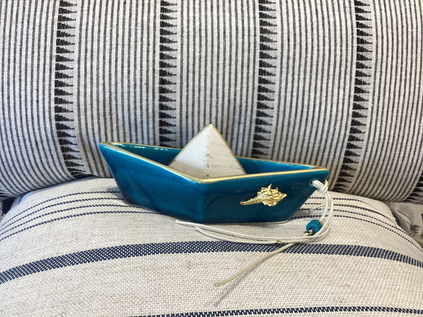 Blue ceramic boat with gold shell