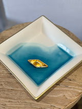 Large cream ceramic plate with gold boat